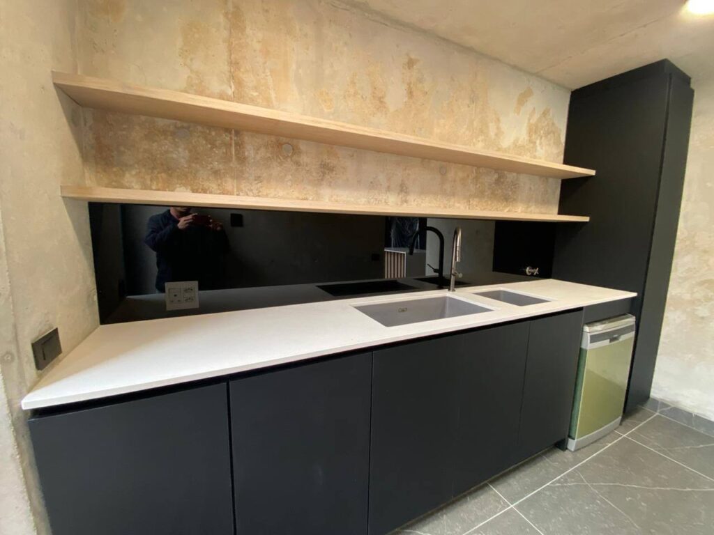 Glass kitchen splash back. Black glass splash back